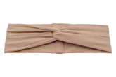 A handmade turban headband for women from By Bella Boutique.
